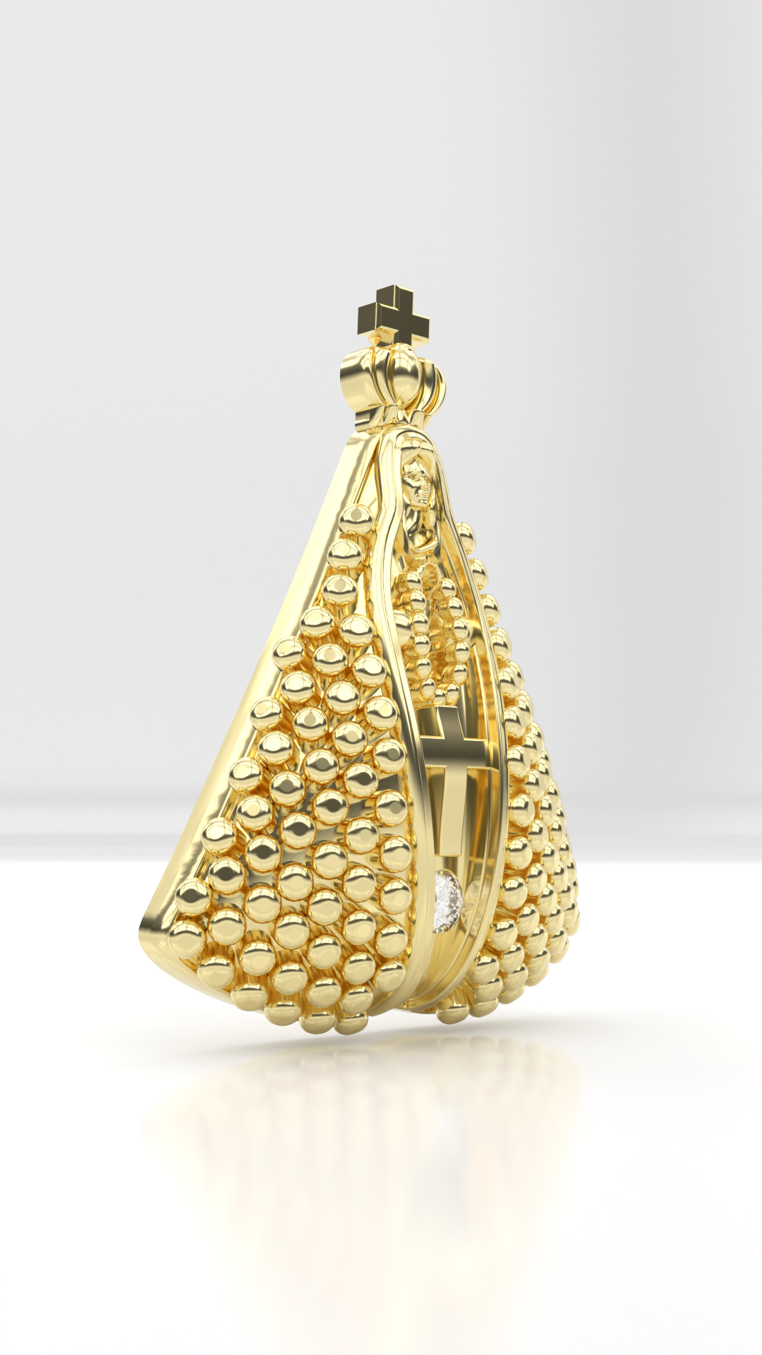 Pingente Nossa Senhora de Aparecida Cravejada com zirconias, em ouro 18.