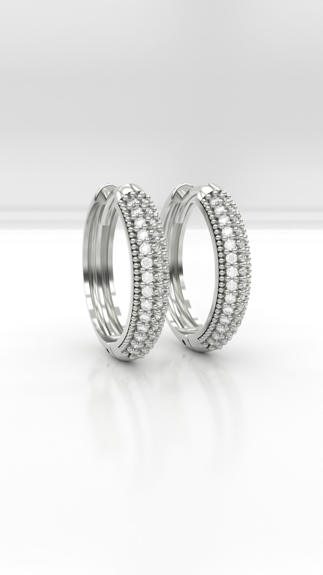 Brinco argola articulada com 2 fileiras de zirconias cravejadas, em prata 925.