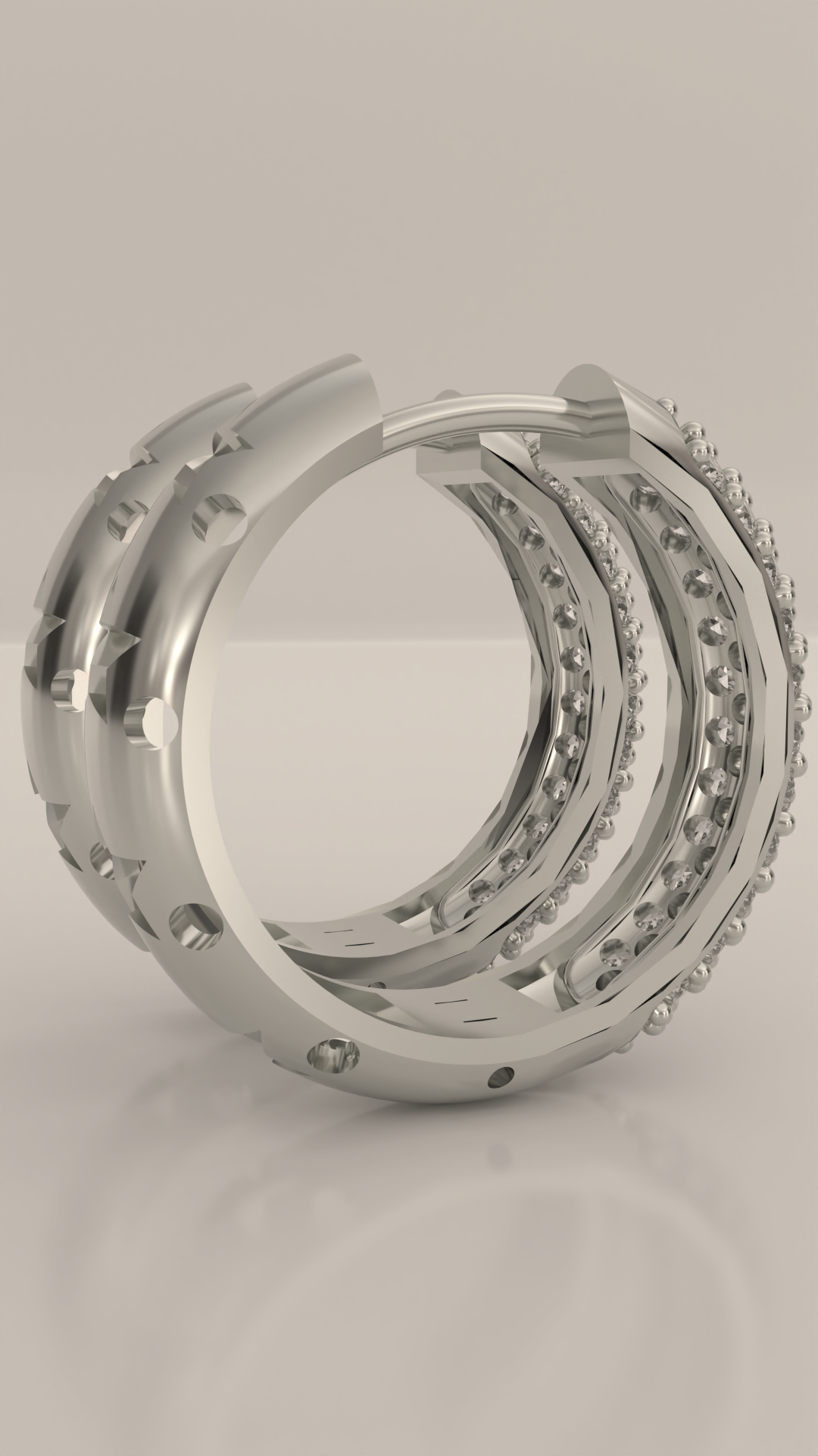 Brinco argola articulada com 3 fileiras de zirconias cravejadas, em prata 925.